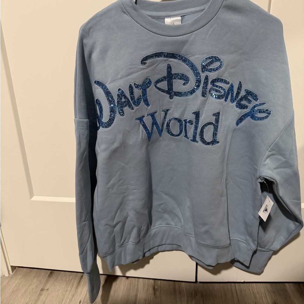 Walt Disney World blue sequin pullover NWT large